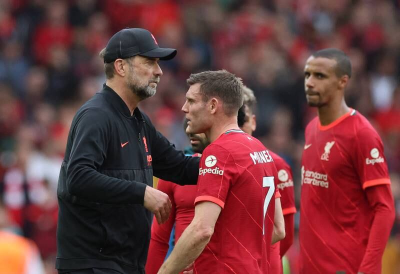 Jurgen Klopp with Jamies Milner at the end of the match after Liverpool fell just short of winning the Premier League title. Reuters