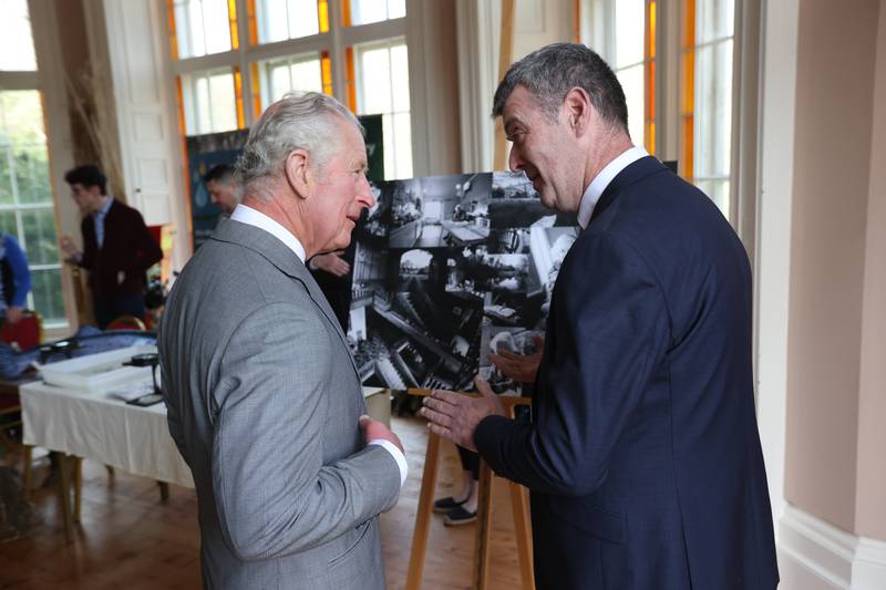 The Prince of Wales meets photographer John O'Neill at a reception at Lissan House. PA