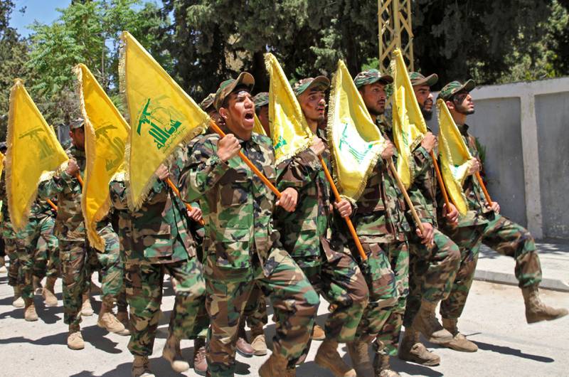 Hezbollah fighters take part in a parade in Lebanon's eastern Bekaa Valley. AFP