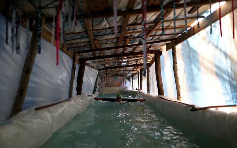 Argentine Paralympian Sebastian Galleguillo trains in the swimming pool his family built for him during the outbreak of the coronavirus disease, in Florencio Varela, on the outskirts of Buenos Aires, on Monday, July 13. Reuters