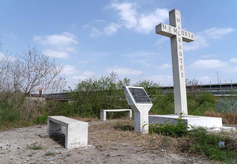 A shrine to migrants along the banks or the Rio Grande River in Reynosa, Mexico. The US is on the other side of the river. Willy Lowry/ The National