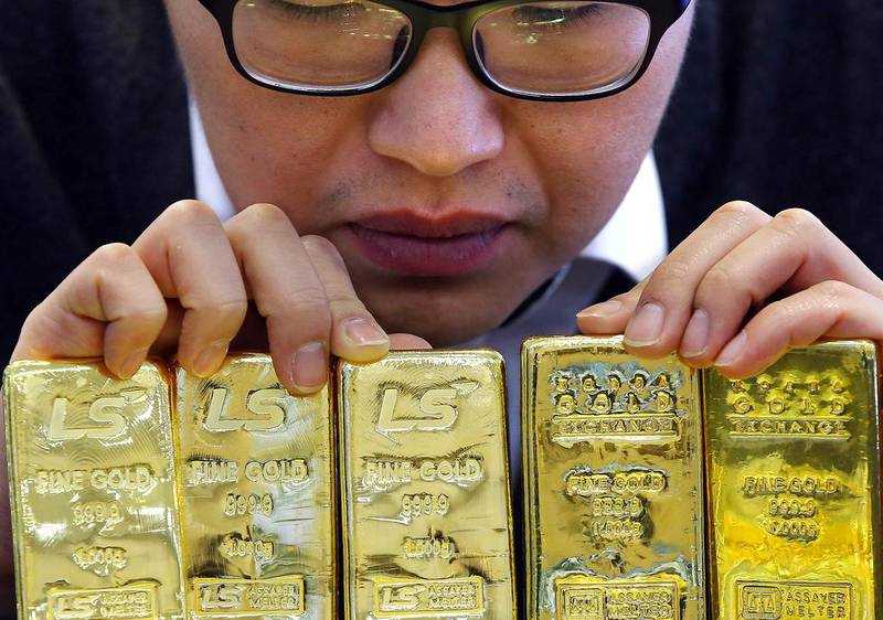 Gold is considered a safe-haven investment against inflation. EPA
