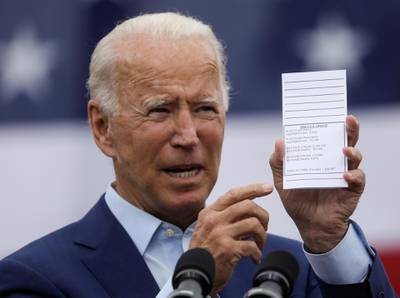 Democratic U.S. presidential nominee and former Vice President Joe Biden holds a copy of his schedule and notes as he delivers remarks during a campaign event in Warren, Michigan, U.S., September 9, 2020. REUTERS/Leah Millis     TPX IMAGES OF THE DAY