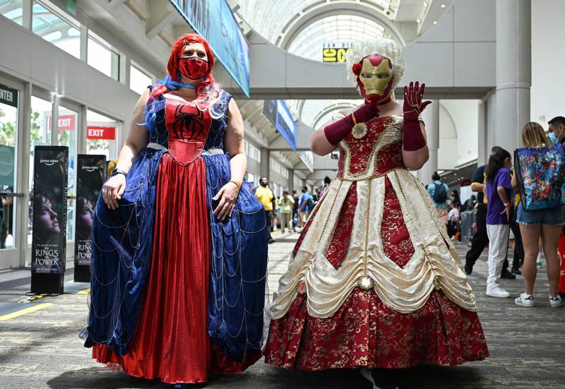 Spider-Man and Iron Man-inspired princess cosplayers. AFP