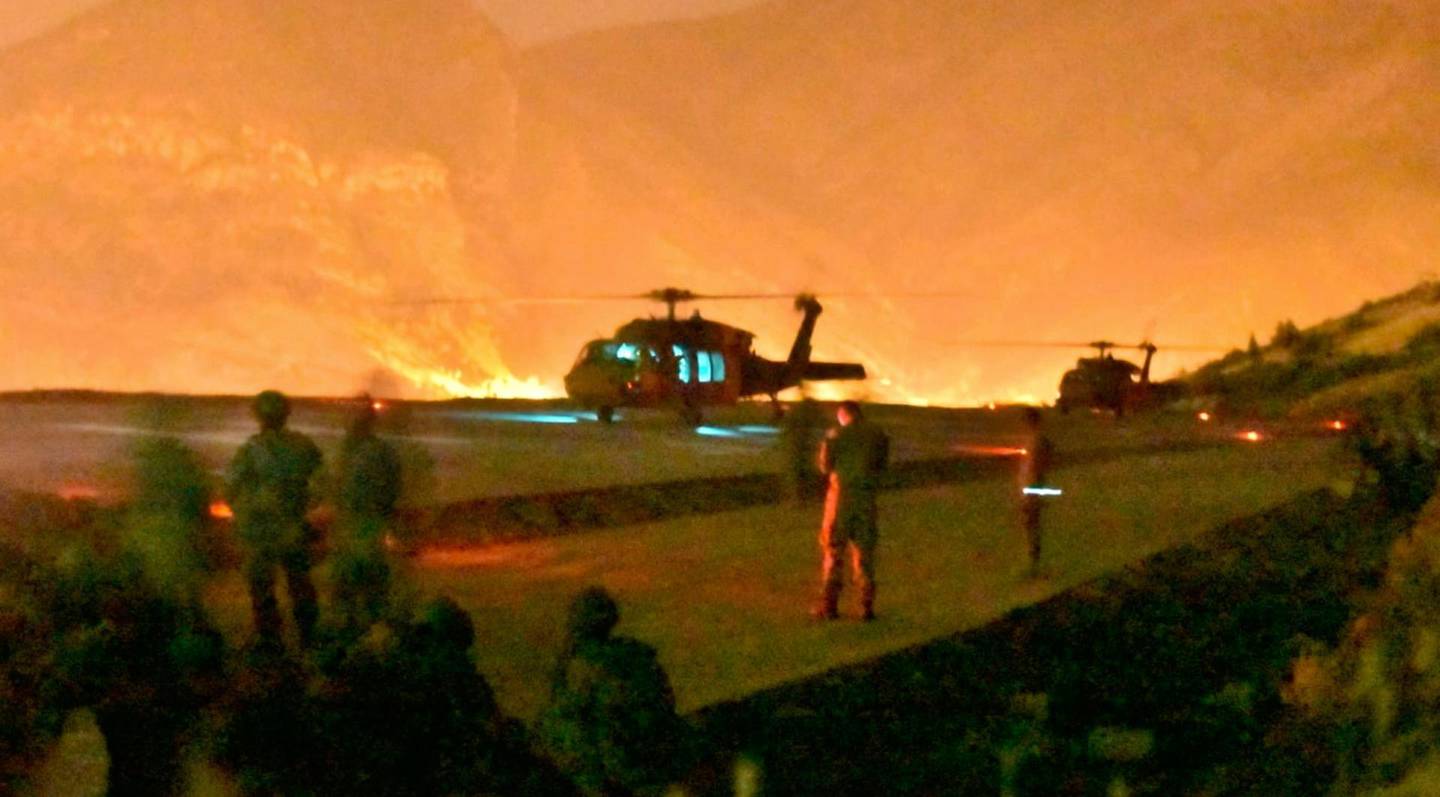 In this photo provided by the Turkish Ministry of Defence on Wednesday, June 17, 2020, Turkish troops in action against Kurdish militants in northern Iraq. Turkey says it has airlifted troops for a cross-border ground operation against Turkey's Kurdish rebels in northern Iraq. The Defense Ministry in Ankara says the airborne offensive in Iraqâ€™s border region of Haftanin was launched on Wednesday following intense artillery fire into the area. The ministry says commando forces are being supported by warplanes, attack helicopters, artillery and armed and unarmed drones. (Turkish Ministry of Defence via AP)