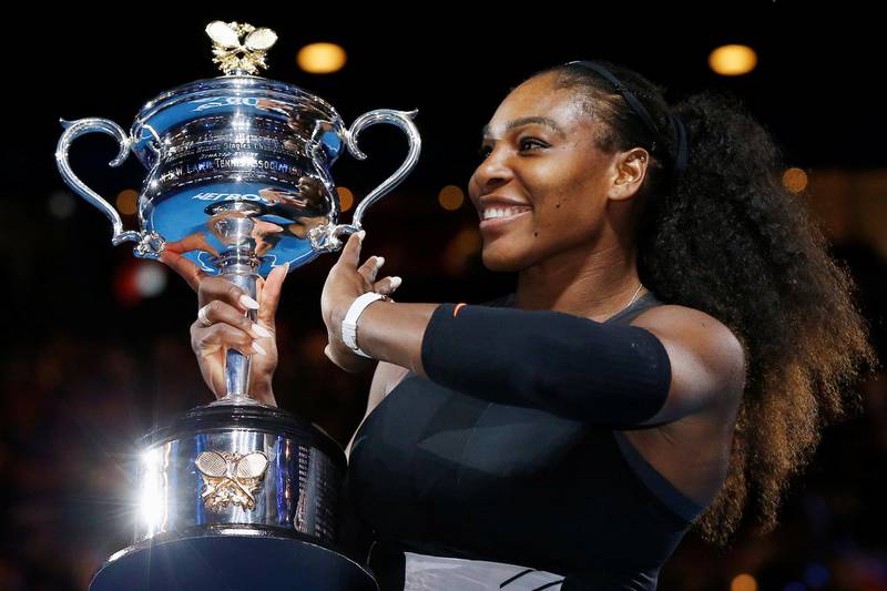 FILE PHOTO: Tennis - Australian Open - Melbourne Park, Melbourne, Australia - 28/1/17 Serena Williams of the U.S. holds her trophy after winning her Women's singles final match against Venus Williams of the U.S. .REUTERS/Issei Kato/File Photo