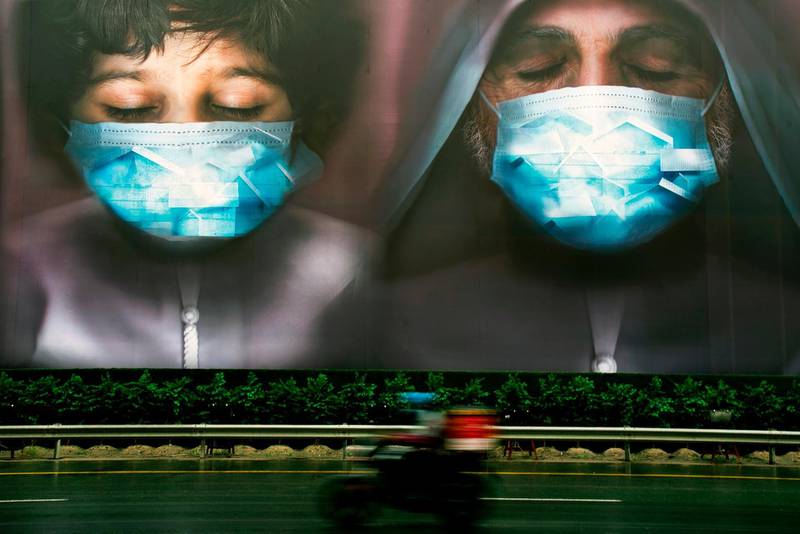 A billboard urges people to stay home during the coronavirus pandemic in Dubai, United Arab Emirates. AP