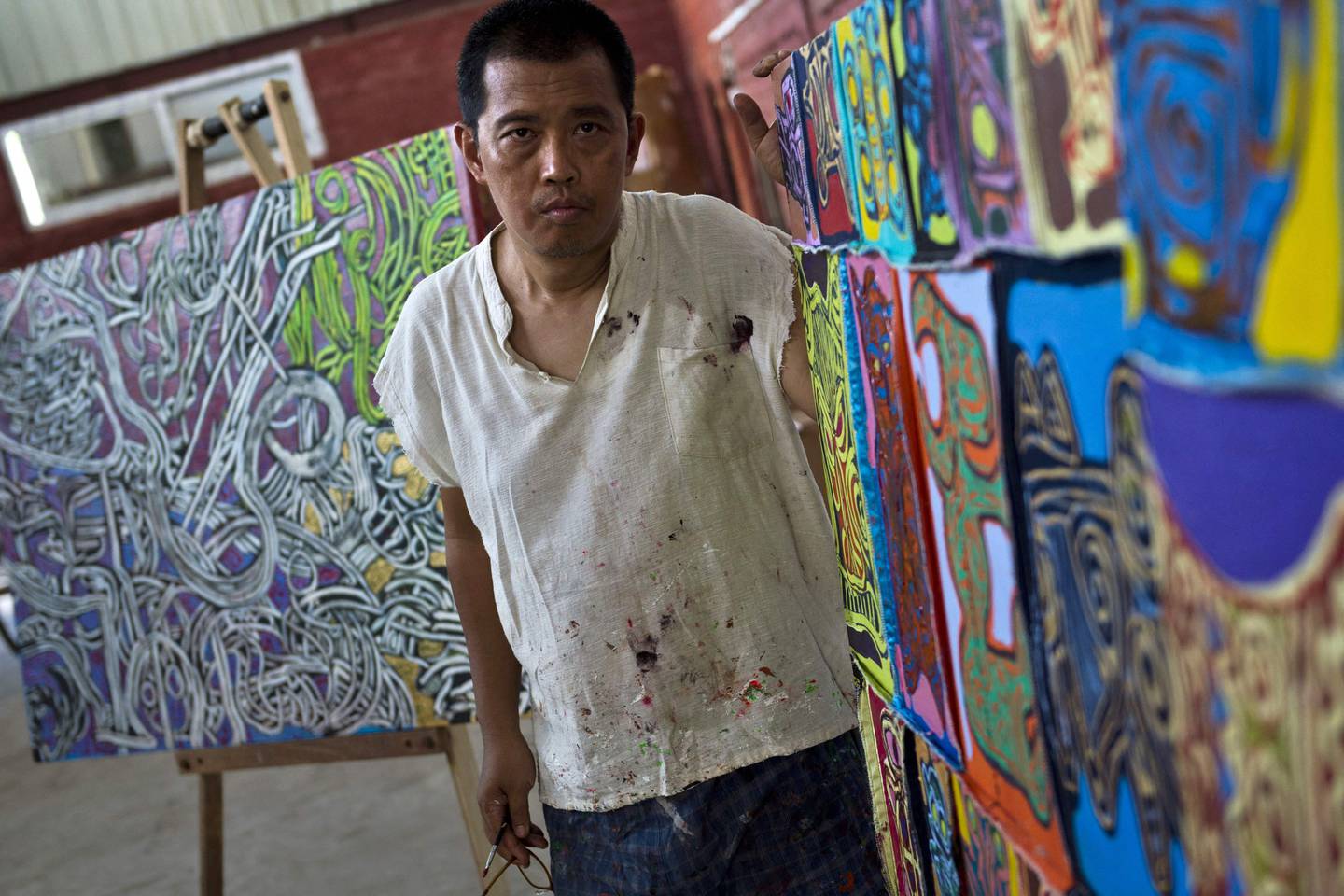 Myanmar artist Htein Lin in his studio in Yangon in 2015. AFP