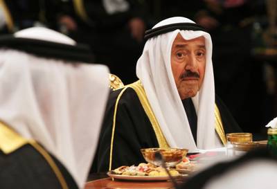 Kuwait's emir, Sheikh Sabah Al Ahmad Al Sabah, presides over the Gulf Cooperation Council summit in Kuwait City, Tuesday, Dec. 5, 2017. Kuwait hosted a meeting Tuesday of the Gulf Cooperation Council that saw Qatar's ruling emir attend, but other rulers stayed away amid the ongoing boycott targeting Doha. (AP Photo/Jon Gambrell)
