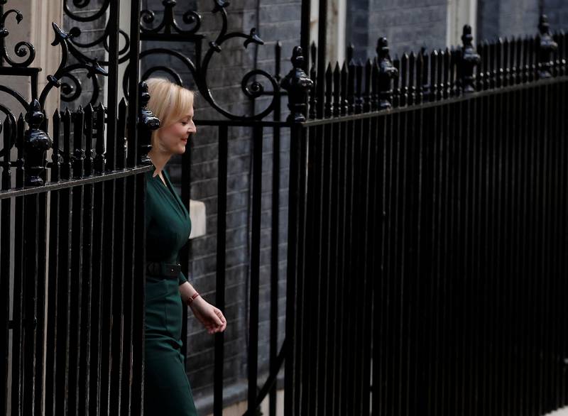 Ms Truss walks out of Number 10. Reuters
