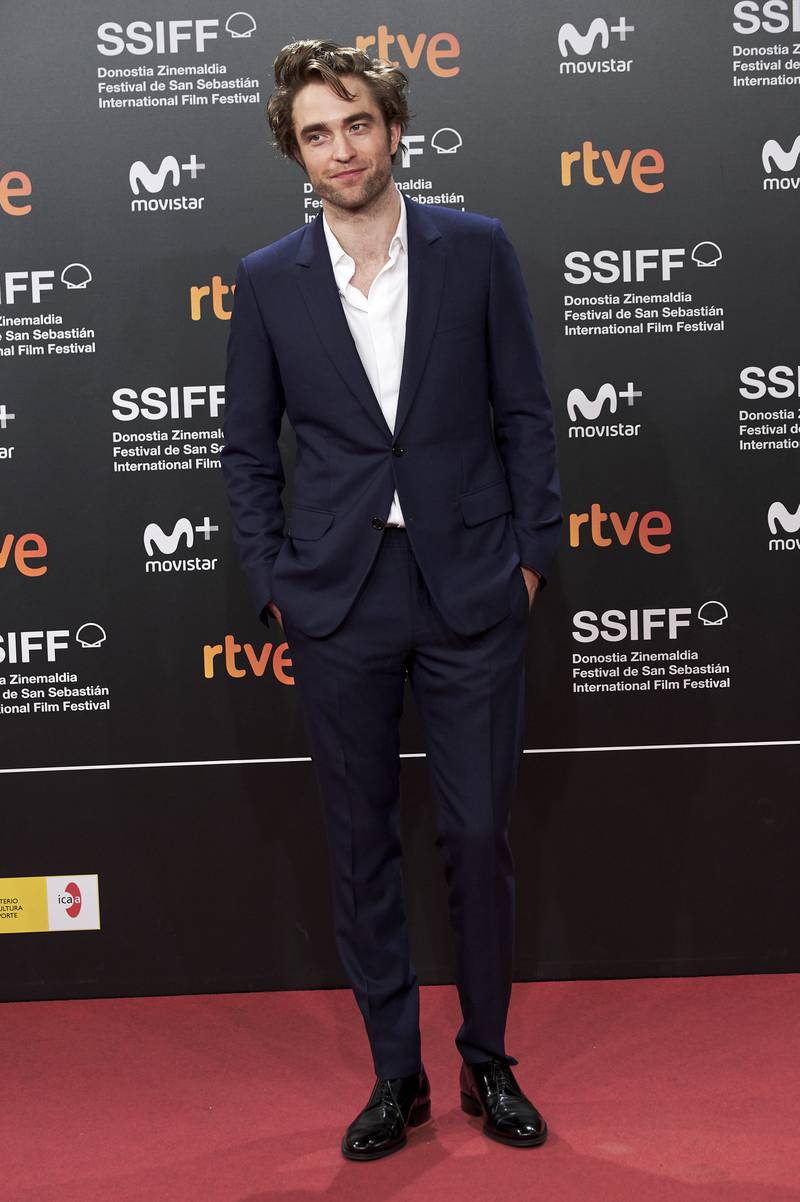 Robert Pattinson, in a blue suit, attends the 'High Life' premiere during the 66th San Sebastian International Film Festival on September 27, 2018. Getty Images