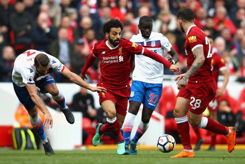 LIVERPOOL, ENGLAND - APRIL 28:  Mohamed Salah of Liverpool goes past Erik Pieters of Stoke City during the Premier League match between Liverpool and Stoke City at Anfield on April 28, 2018 in Liverpool, England.  (Photo by Clive Brunskill/Getty Images)