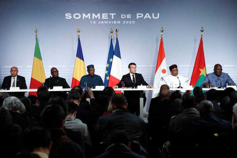 French President Emmanuel Macron, Third right, flanked by Mali's President Ibrahim Boubacar Keita, second left, Burkina Faso's President Roch Marc Christian Kabore, right, Niger President Mahamadou Issoufou second right, Mauritania's President Mohamed Ould Cheikh El Ghazouani, left, and Chad's President Idriss Deby, third right, attend a press conference following the G5 Sahel summit in Pau, southwestern France, Monday Jan.13, 2020. France is preparing its military to better target Islamic extremists in a West African region that has seen a surge of deadly violence. (Guillaume Horcajuelo/Pool Photo via AP)