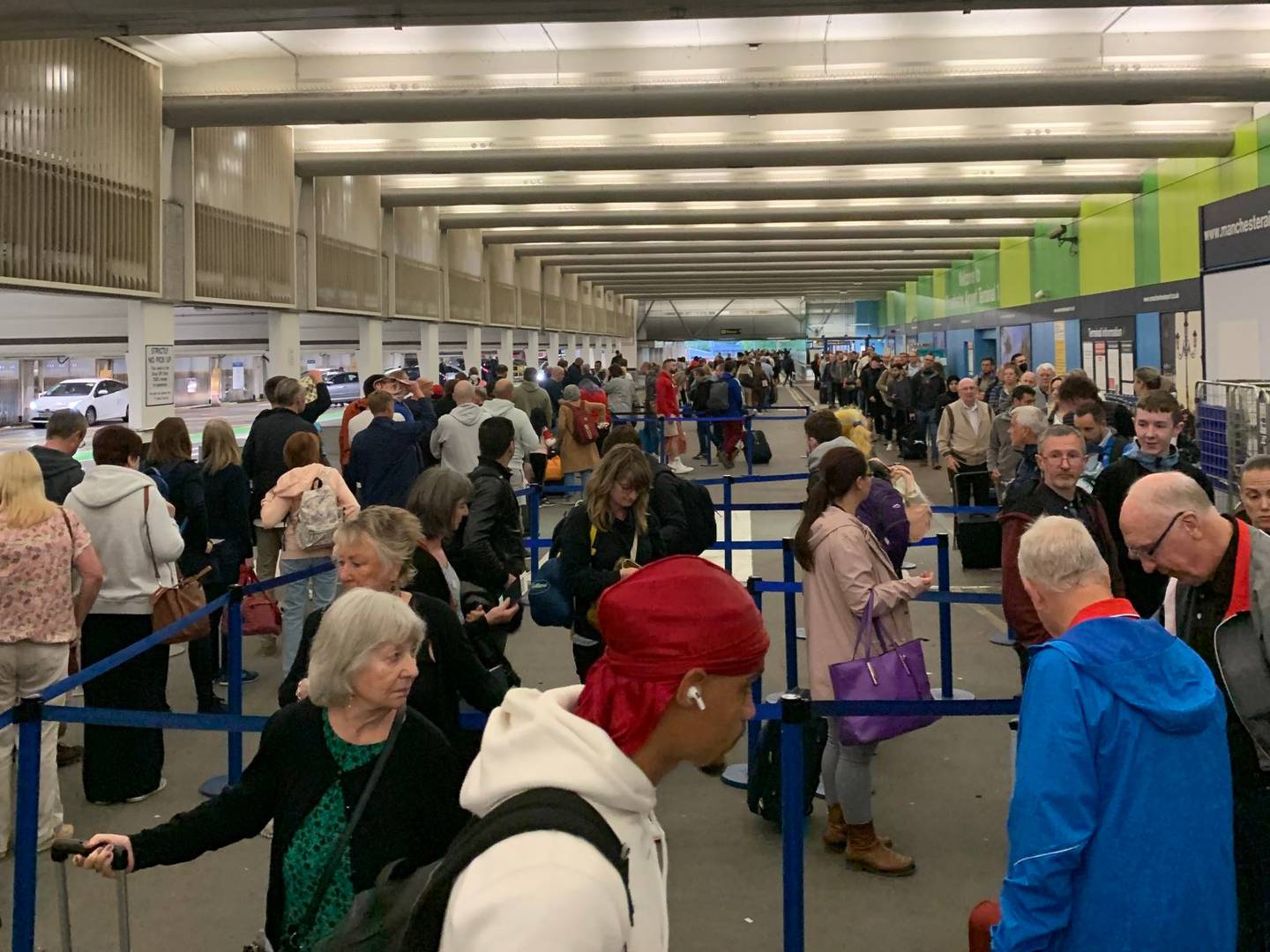 Lengthy queues formed at Manchester Airport as staff shortages continue to bite. Photo: Tim Warner / Twitter