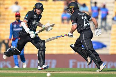 New Zealand's captain Tom Latham, left, and Glenn Phillips run between the wickets. AFP