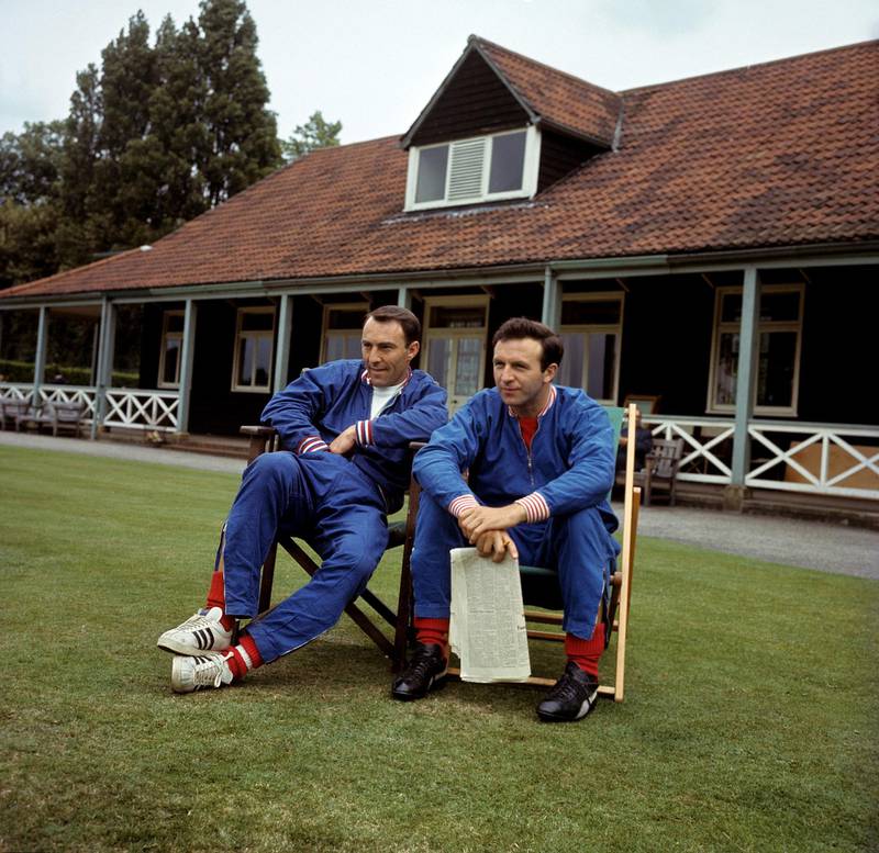 Greaves and Jimmy Armfield take it easy during a training session at Roehampton  on July 15, 1966. PA