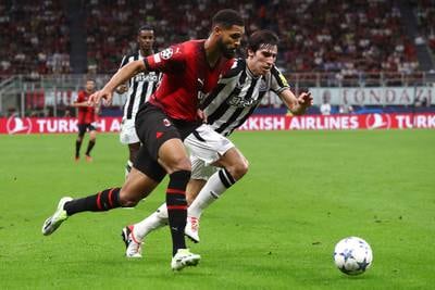 Ruben Loftus-Cheek of AC Milan and Sandro Tonali of Newcastle United fight for the ball. Getty