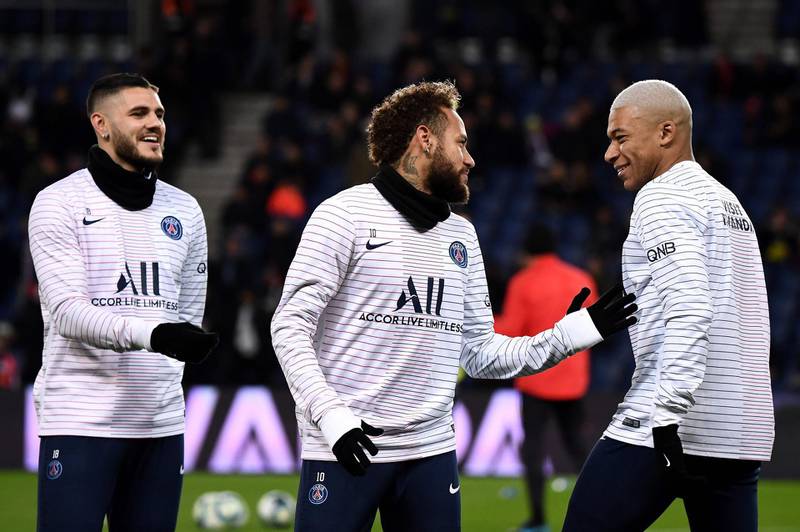 Mauro Icardi, left, is happy to compete with the likes of Neymar, centre, and Kylian Mbappe, right for a starting berth at PSG after making his loan from Inter Milan permanent. AFP