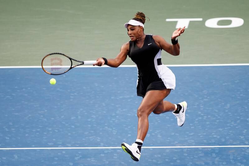 Serena Williams returns a ball during her match against Belinda Bencic. Reuters