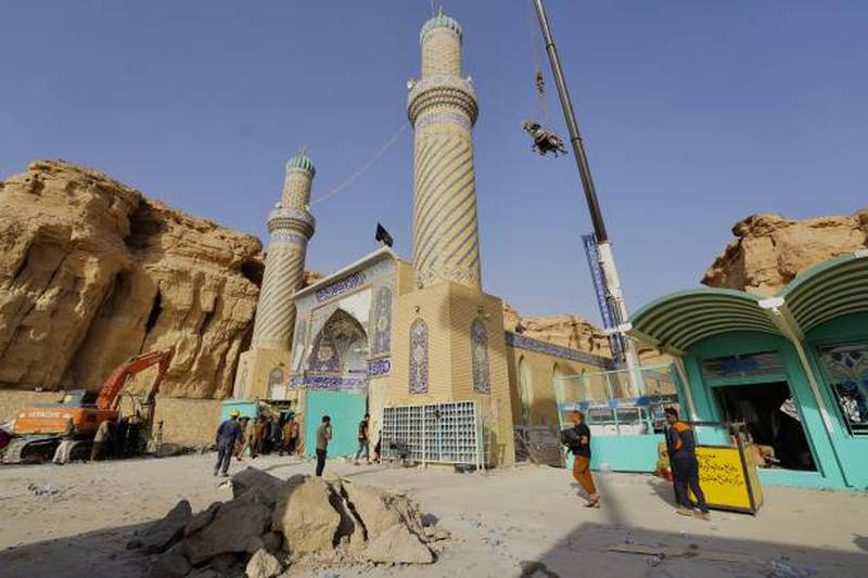 The shrine, which is revered by Shiites, partially collapsed when it was hit by the landslide. Getty