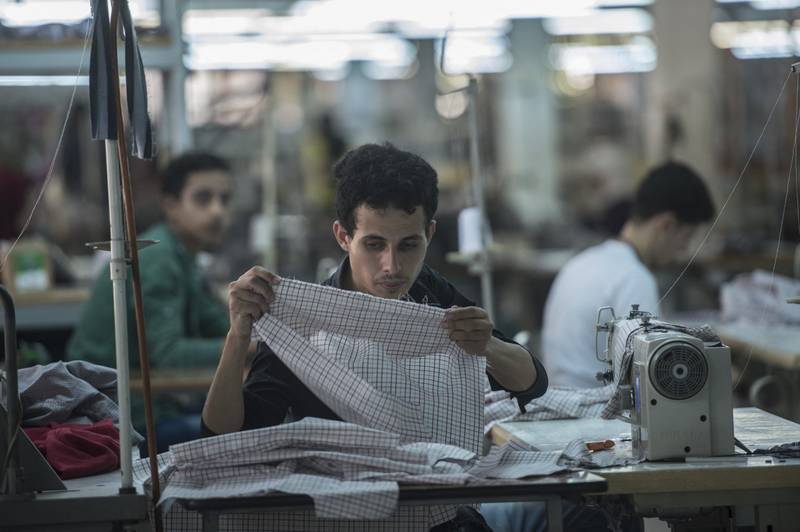 A tailor at the factory. AFP