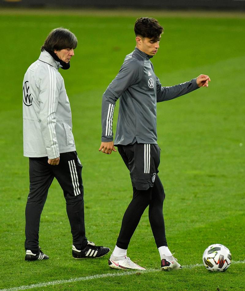 German manager Joachim Low, left, watches Kai Havertz during a training session prior the Uefa Nations League match against Switzerland. AP Photo