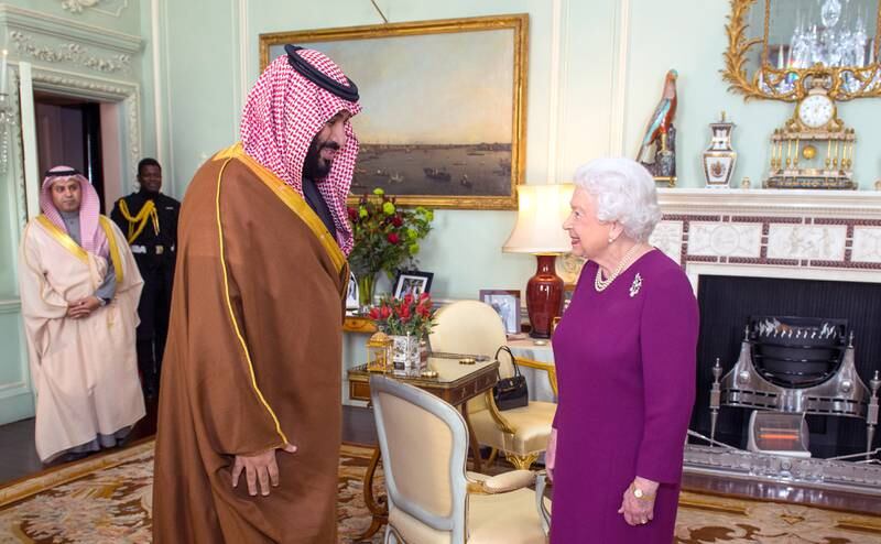 Queen Elizabeth greets Crown Prince Mohammed bin Salman of Saudi Arabia during a private audience at Buckingham Palace in March 2018. Getty Images