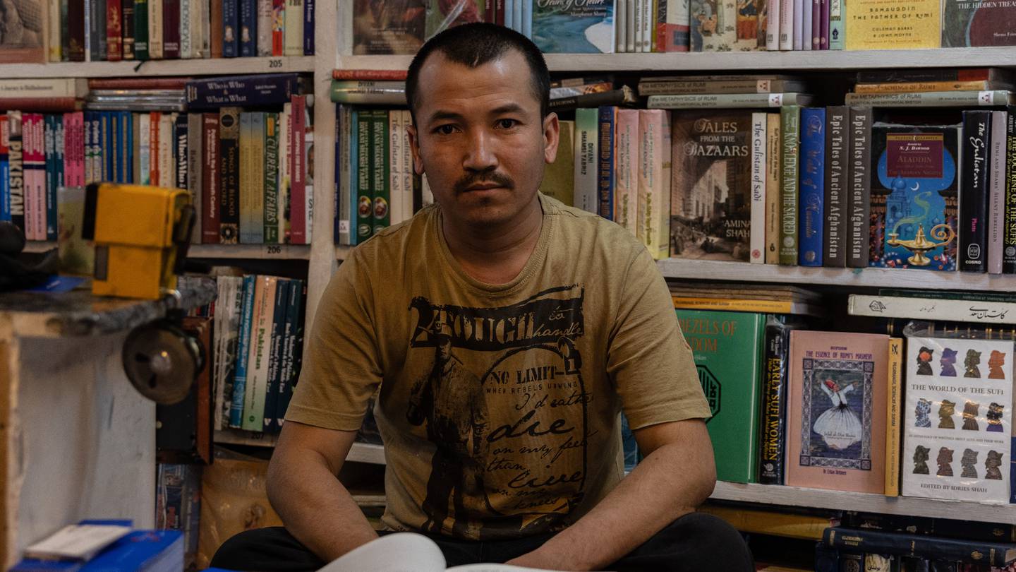 Khairuddin Youssufi, 26, has worked at the bookstore for 12 years. He says it's where he received most of his education - through the books. Stefanie Glinski for The National
