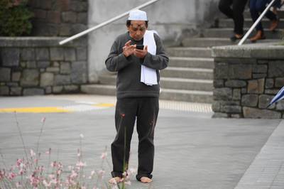 Hamzah Noor Yahaya, a survivor of the shootings at Al Noor mosque, stands in front of Christchurch Hospita. Getty Images