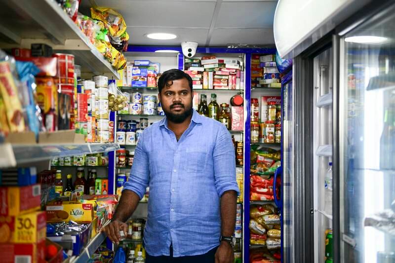 Shihab Kadavanda, manager of Ahla Zahra Groceries said most of their customers are staying at home. Khushnum Bhandari / The National