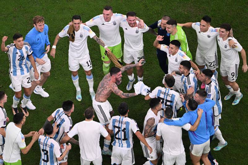 Argentina's players celebrate at the end of the Qatar 2022 World Cup football semi-final match between Argentina and Croatia. AFP