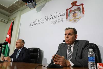 Jordanian Health Minister Saad Jaber and Minister for Media Affairs Amjad al-Adaileh attend a news conference after the country's first case of the coronavirus was confirmed, at the headquarters of the Prime Minister in Amman, Jordan. Reuters
