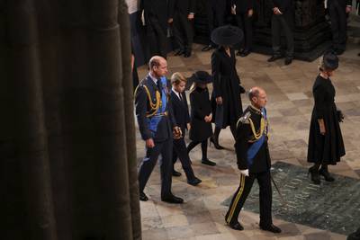 Prince William, his wife Catherine, the Princess of Wales, and their children Prince George and Princess Charlotte arrive at Westminster Abbey. AP