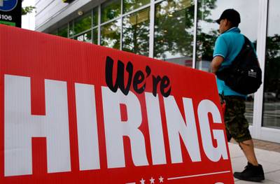 A restaurant in Arlington, Virginia, advertising job vacancies. AFP