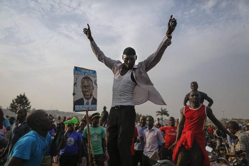 Supporters of Kizza Besigye, the leader of the main opposition Forum for Democratic Change (FDC) and the main opposition candidate, cheer as they wait for the arrival of Besigye during a campaign rally in Kampala, Uganda. Uganda will go to the polls February 18 in presidential and parliamentary elections. Dai Kurokawa / EPA