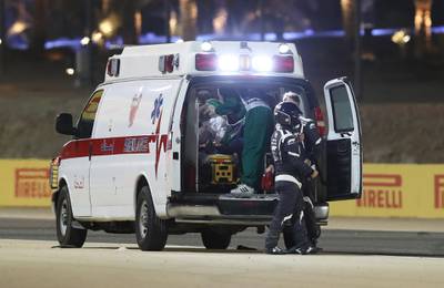 Haas' Romain Grosjean is taken in an ambulance. Reuters