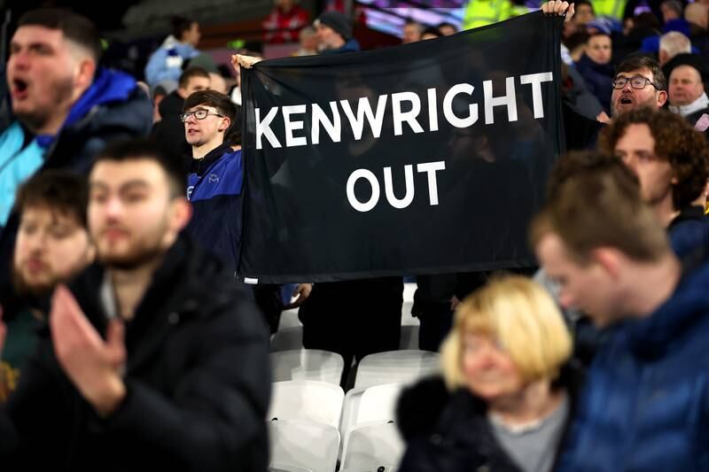Everton fans hold a 'Kenwright Out' flag. Getty