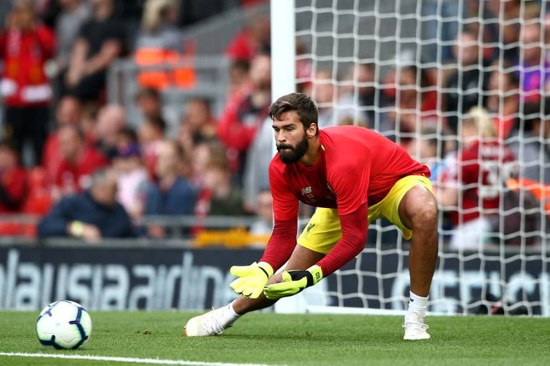 LIVERPOOL, ENGLAND - AUGUST 07: Alisson Becker of Liverpool warms up during the pre-season friendly match between Liverpool and Torino at Anfield on August 7, 2018 in Liverpool, England. (Photo by Jan Kruger/Getty Images)