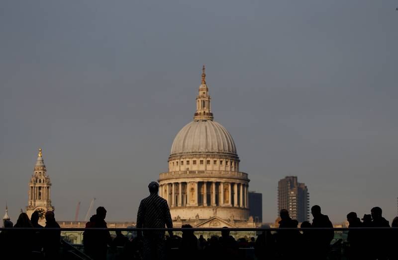 FILE PHOTO: Pedestrians use the Millennium Bridge on the South Bank, opposite St Paul's Cathedral, in London, Britain December 27, 2018. REUTERS/Henry Nicholls/File Photo