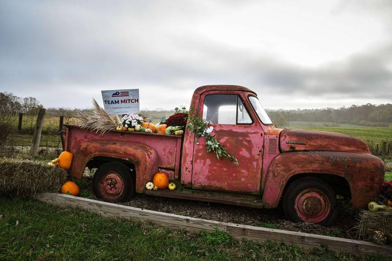 -A truck adorned with decorations and a Mitch McConnell sign sits outside of the venue where U.S. Senate Majority Leader Sen. Mitch McConnell, makes a campaign stop.  AFP