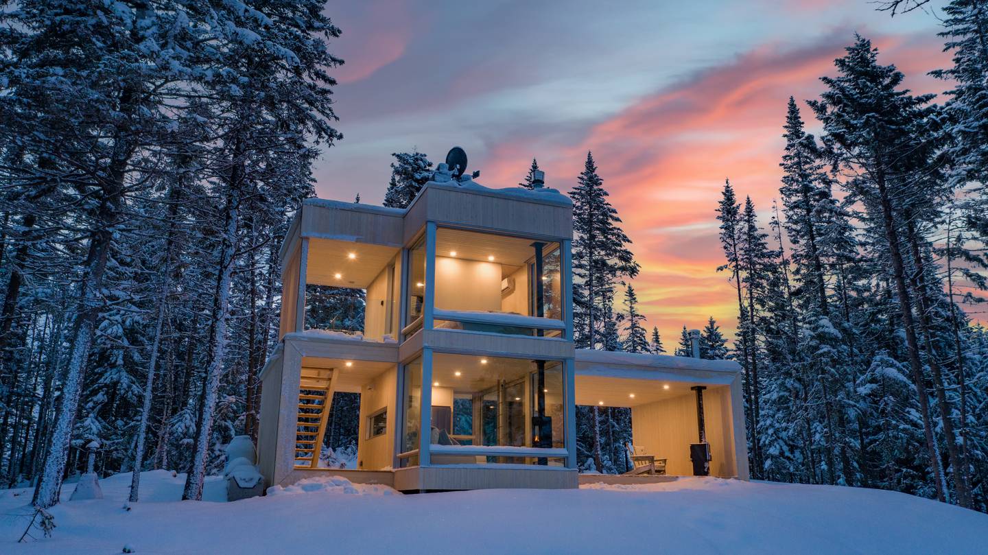 This glass-fronted home in Quebec is the most 'wish-listed' ski-in/ski-out home on Airbnb. Photo: Citizen North / Nick Dignard / Airbnb