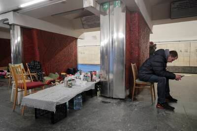 Ukrainians shelter in an underground train station during the day in Kyiv. EPA