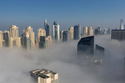 DUBAI, UAE. January 8, 2015 - Morning fog sweeps over Dubai Marina, January 8, 2015. (Photos by: Sarah Dea/The National, Story by: Standalone, News) *** Local Caption ***  SDEA080115-fog01.JPG