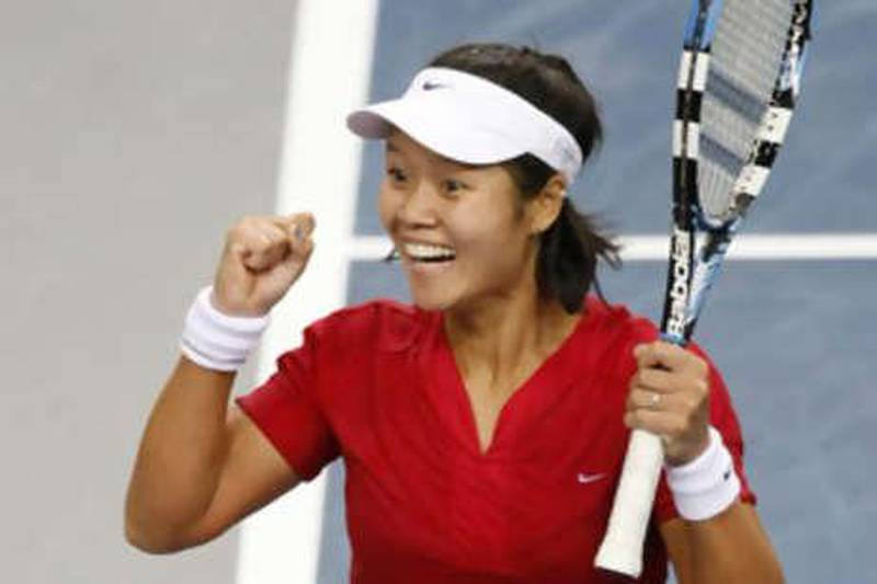 Na Li reacts after defeating Serena Williams in the second round of the Stuttgart Grand Prix.
