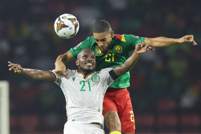 Cameroon defender Jean-Charles Castelletto is challenged by Comoros'forward El Fardou Nabouhane. AFP