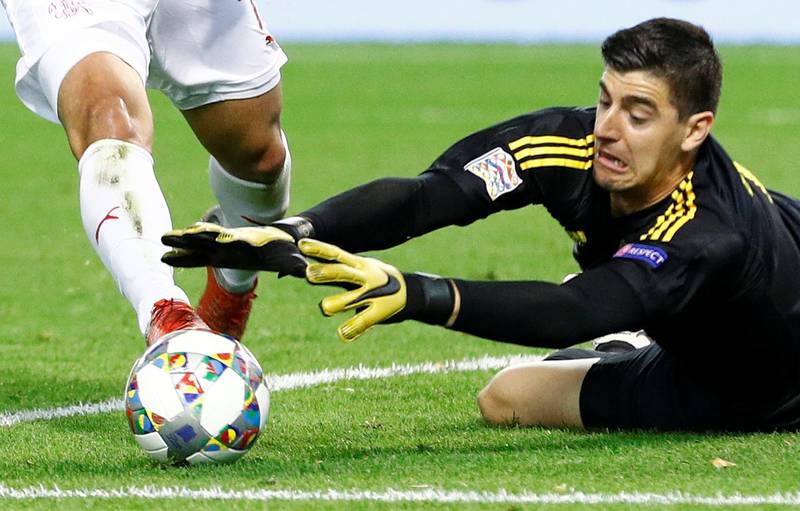 Belgium goalkeeper Thibaut Courtois makes a save. Reuters