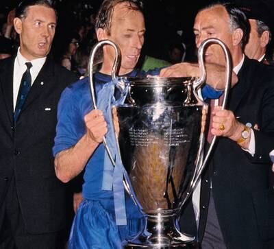 Manchester United's Bobby Charlton lifts the European Cup in 1968. PA