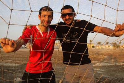 Brothers and former Bahrain national football team players Mohammed, left, and Alaa Hubail were arrested after joining peaceful protests with other athletes.