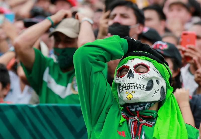 A Mexico fan in Mexico City watches the game against Saudi Arabia. Reuters