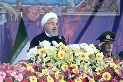 Iran's President Hassan Rouhani speaks at a military parade marking National Army Day in front of the mausoleum of the late revolutionary founder Ayatollah Khomeini, just outside Tehran, Iran, Wednesday, April 18, 2018. (AP Photo/Ebrahim Noroozi)